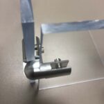 Polished aluminum standoff mounts for plexiglass sneeze barrier