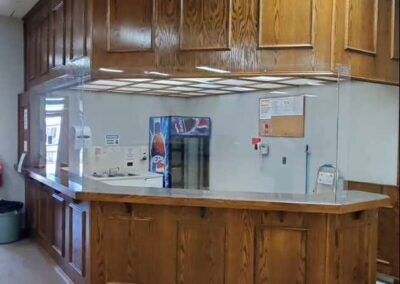 Reception desk sneeze guard barrier custom design and installation